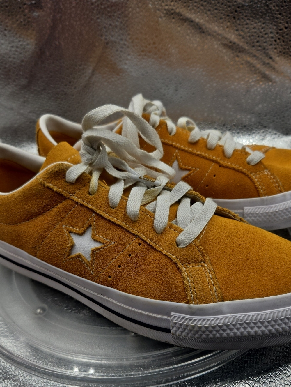 U Orange is white converse, size 7.5.